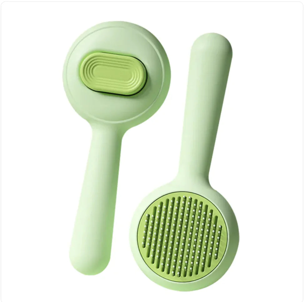 Grooming Brush — dual-function pet brush with non-slip grip