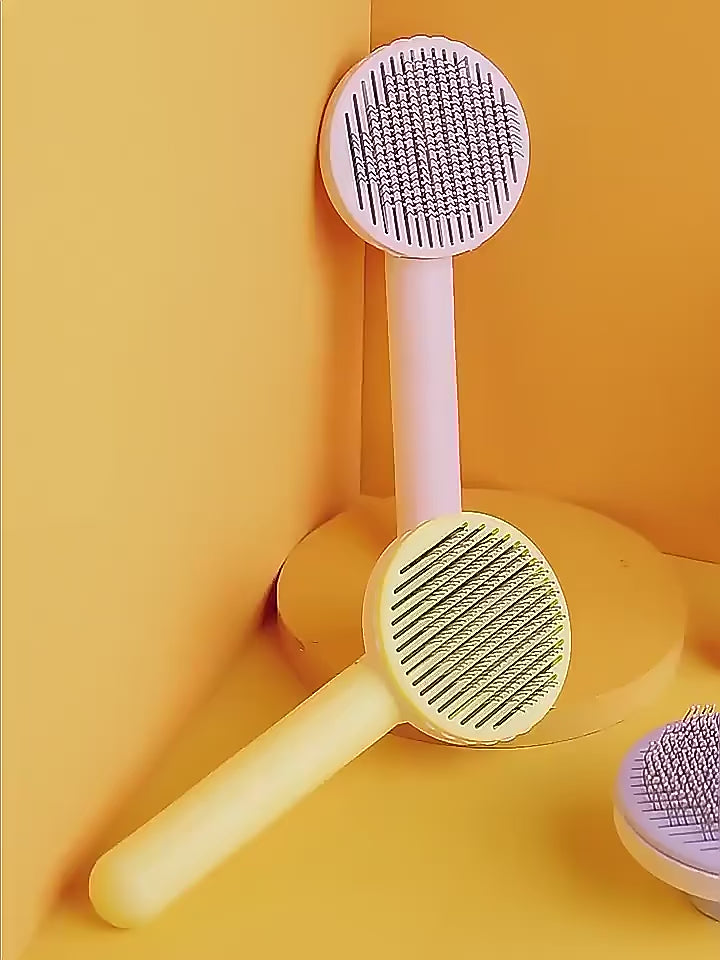 Grooming Brush — dual-function pet brush with non-slip grip